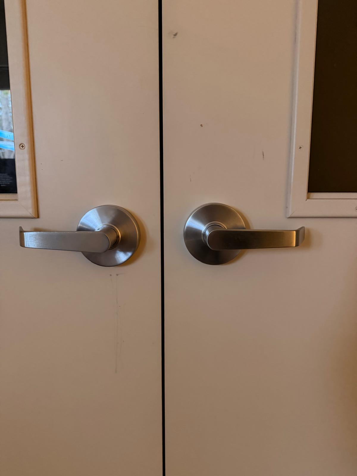 Bluefin double brushed nickel handles on white doors